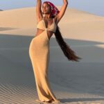 Pure charm knitted cut out halter neck backless sweater maxi