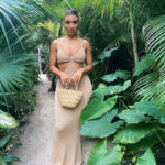 Pure charm knitted cut out halter neck backless sweater maxi