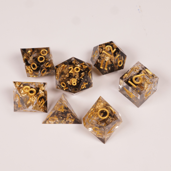 dice - gold flake & black resin D&D dice - gold flake & black resin